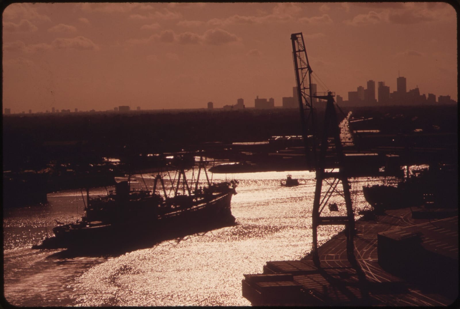 HOUSTON SHIP CHANNEL AT DUSK--SKYLINE OF DOWNTOWN HOUSTON IN BACKGROUND, 1973, Houston