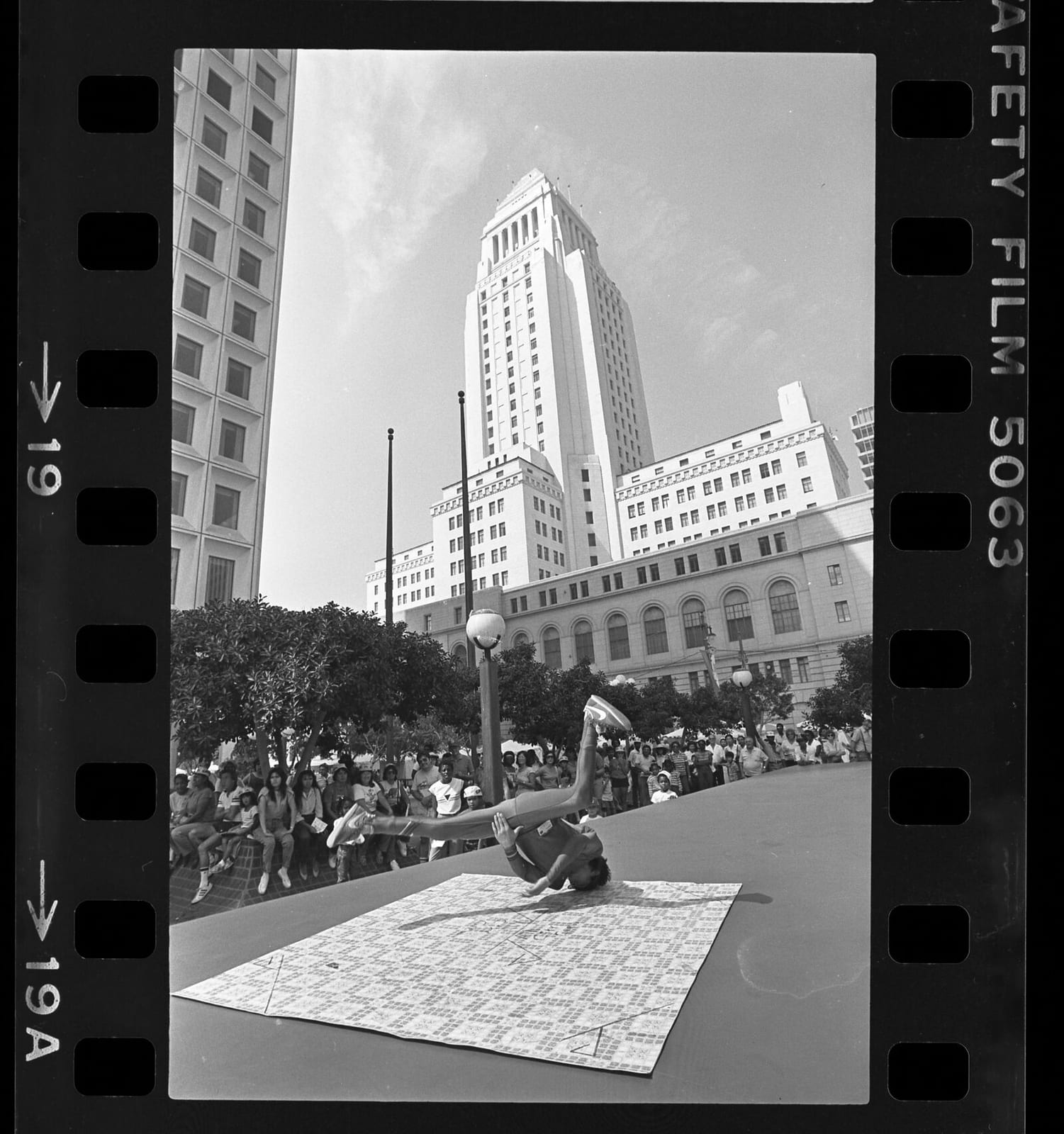 Break dancer performing for crowd at Street Scene Festival in front of Los Angeles City Hall, 1984, 1984, Los Angeles