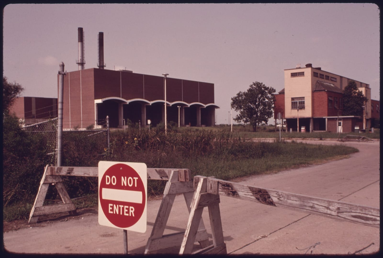 SMOKESTACKS OF THE HOLMES ROAD INCINERATOR, NO LONGER POLLUTE THE ATMOSPHERE. THE PLANT PREVIOUSLY BURNED OLD AUTOMOBILE BATTERIES, PLASTIC AND OTHER MODERN MUNICIPAL TRASH WHICH IT WAS NOT DESIGNED…, 1975, Houston
