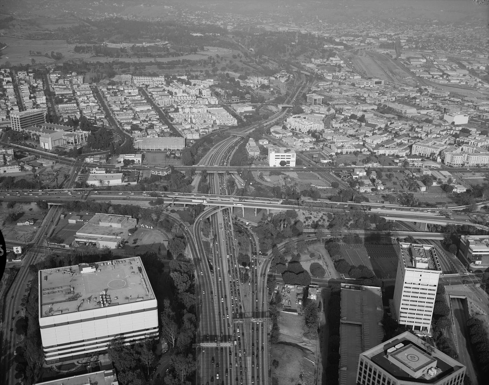 Four Level Interchange of Arroyo Seco Parkway and Highway 101, looking north-east from Downtown Los Angeles - in 1999. Elysian Park in upper left., 1999, Los Angeles