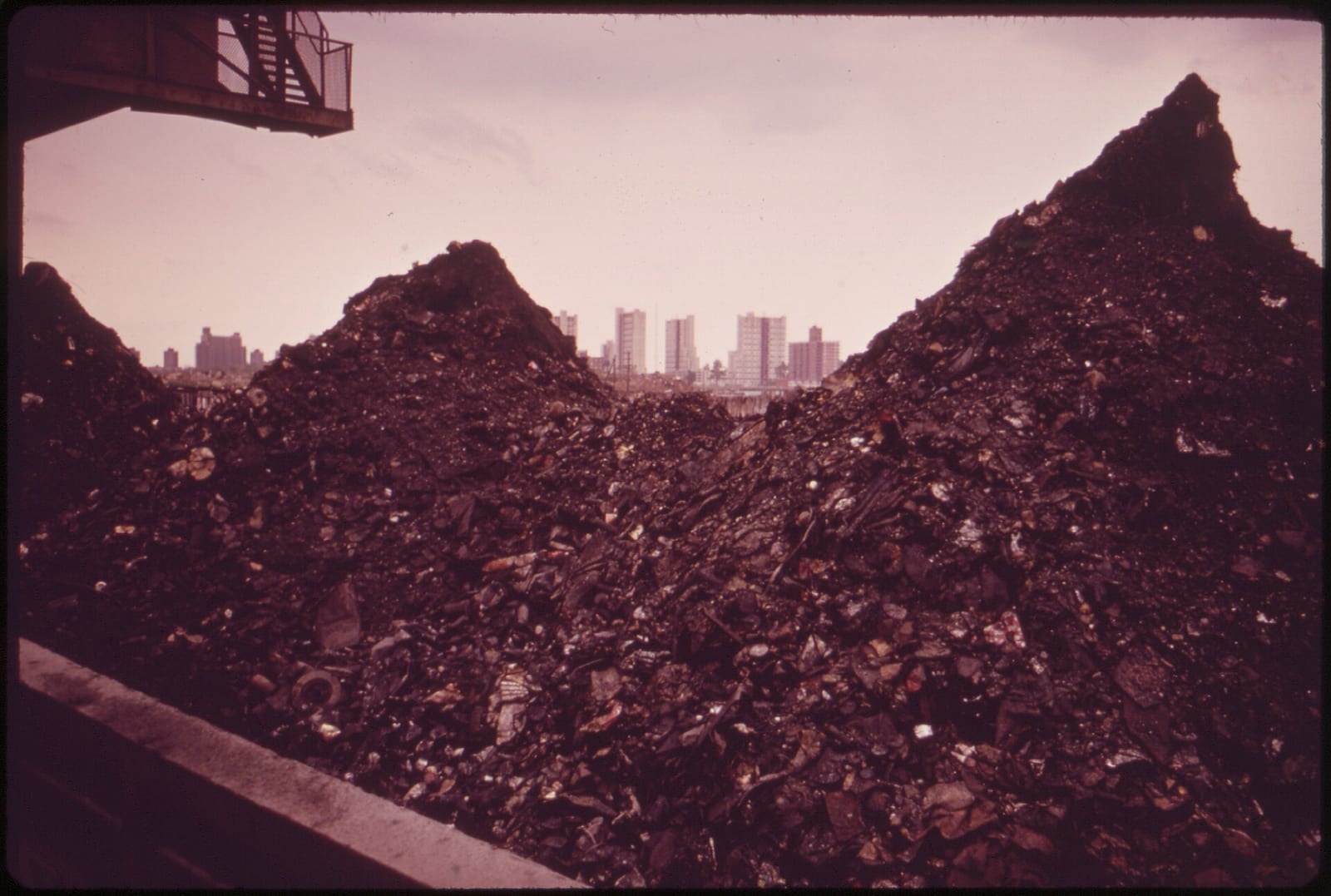 BARGE LOADED WITH ASHES FROM THE GRAVESEND BAY INCINERATION PLANT. ASHES WILL BE TAKEN TO OCEAN FOR DUMPING, 1973, New York City