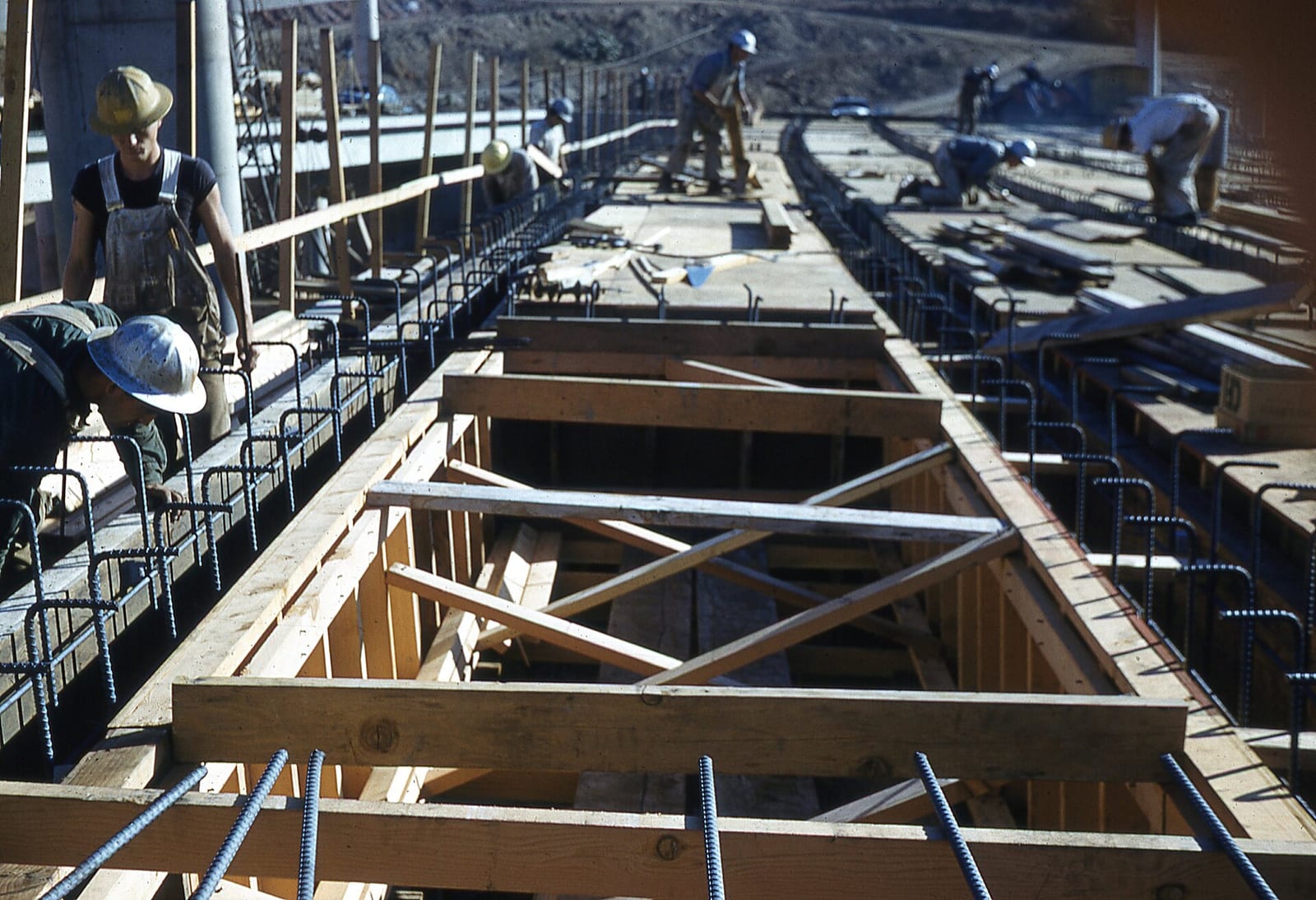 Photograph of East LA Interchange - LA River Bridge construction 1959. "Winkler - T-BEAM Forms L.A. River Br.", 1959, Los Angeles