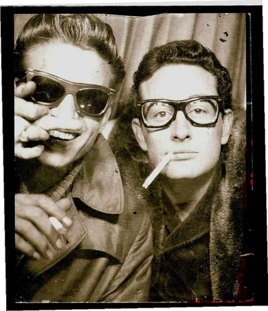 Buddy Holly and Waylon Jennings photographed in a photo-booth in Central Station, in New York City., 1959, New York City