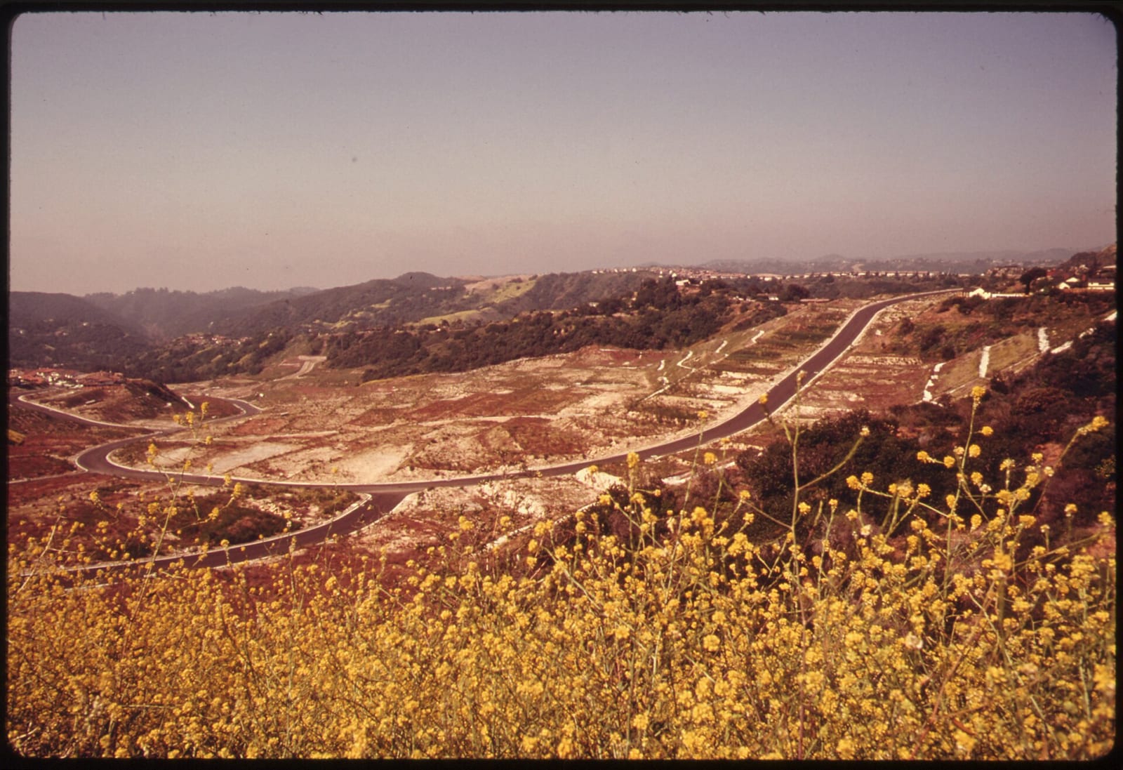 General notes: Regrading for land development in Calabasas , suburbanization in western Los Angeles County , Southern California ., 1975, Los Angeles