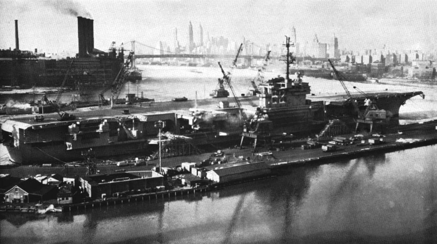 The U.S. Navy aircraft carrier USS Independence (CVA-62) at the New York Naval Shipyard., 1964, New York City
