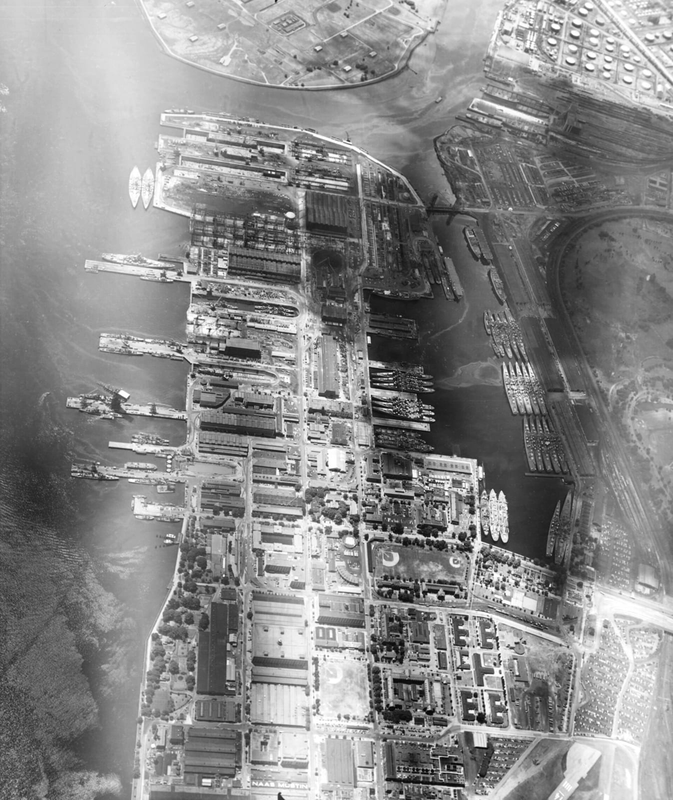 Aerial view of the U.S. Philadelphia Naval Shipyard and Reserve Fleet Basin on 8 June 1954., 1954, Philadelphia