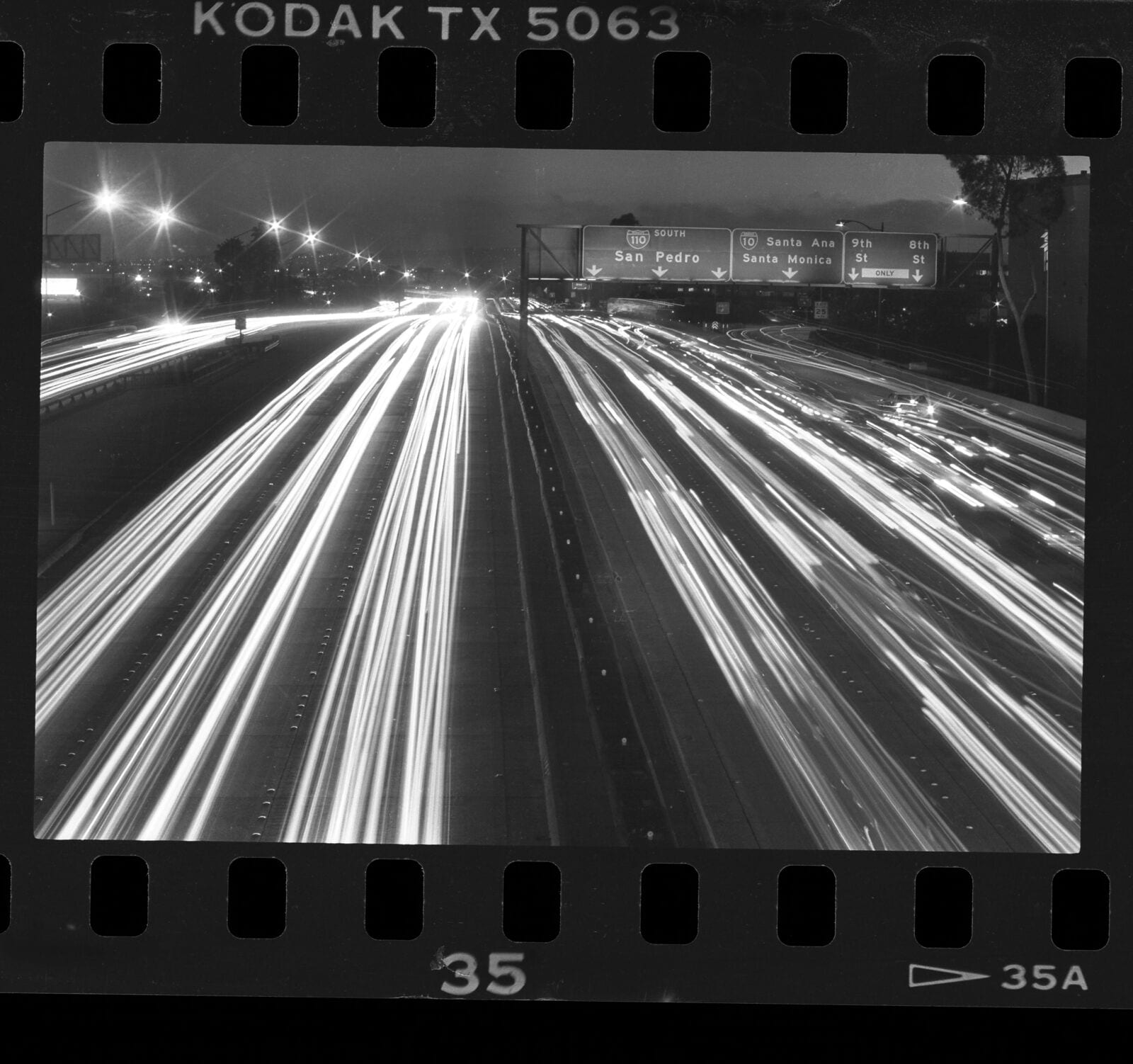 Night photograph, streams of automobile lights on Harbor Freeway, Los Angeles, 1987, 1987, Los Angeles